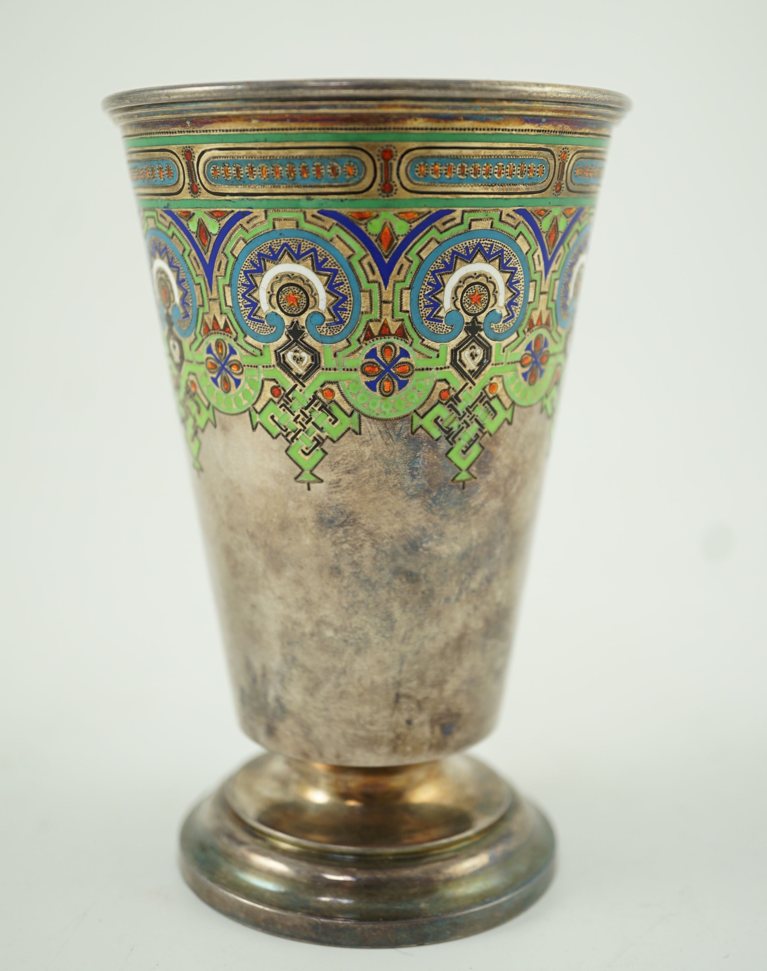 A late 19th century Russian 91 zolotnik silver and polychrome champlevé enamel pedestal beaker, St. Petersburg, maker Pavel Sazikov, 1874